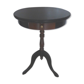 Pedestal table in mahogany style opening through a drawer