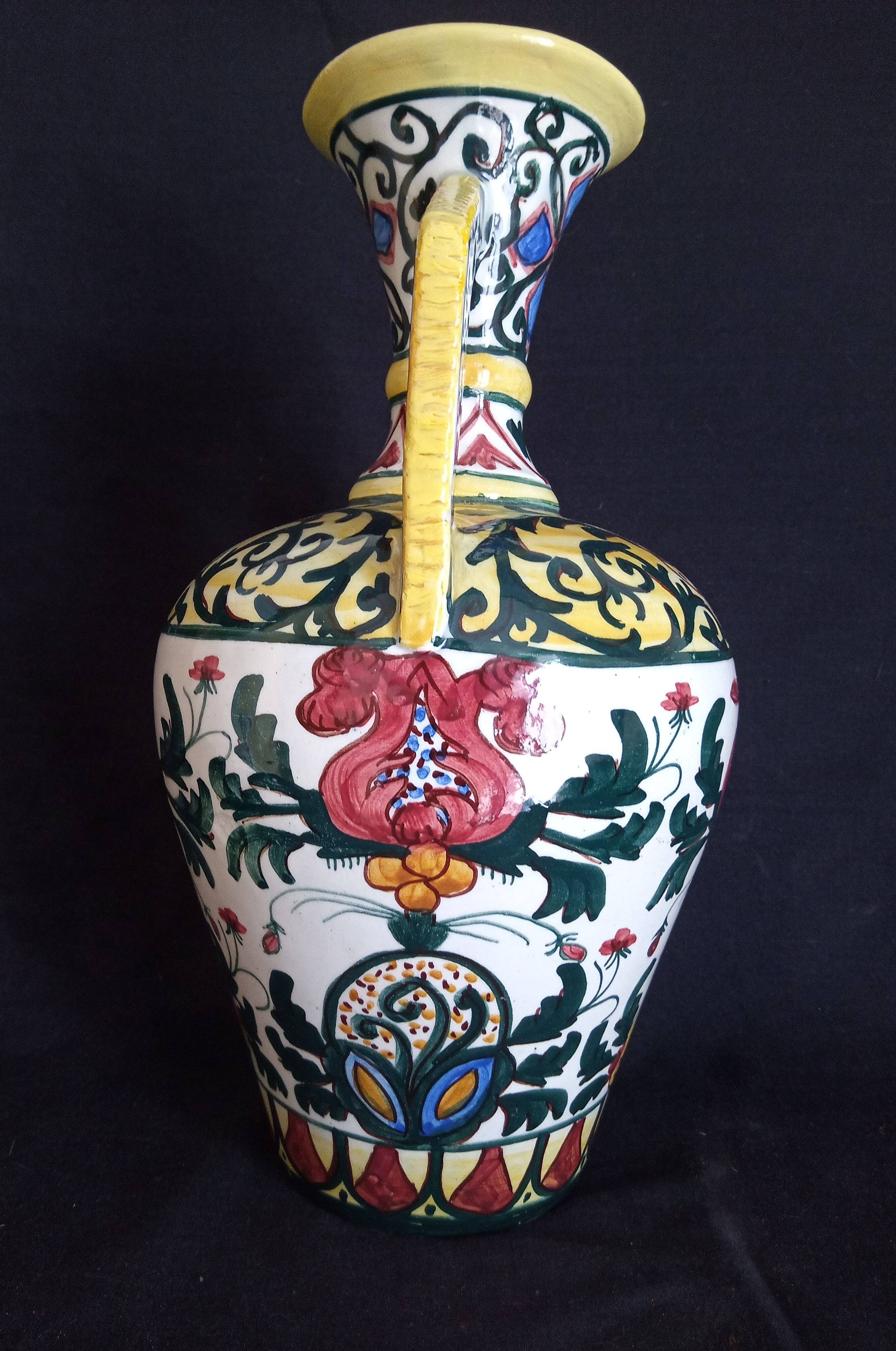 Art Deco ceramic vase with brightly colored abstract patterns