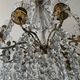 Grand chandelier in Louis XV style with crystal pendants.