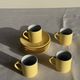 Set of 4 vintage yellow Italian espresso cups and saucers.