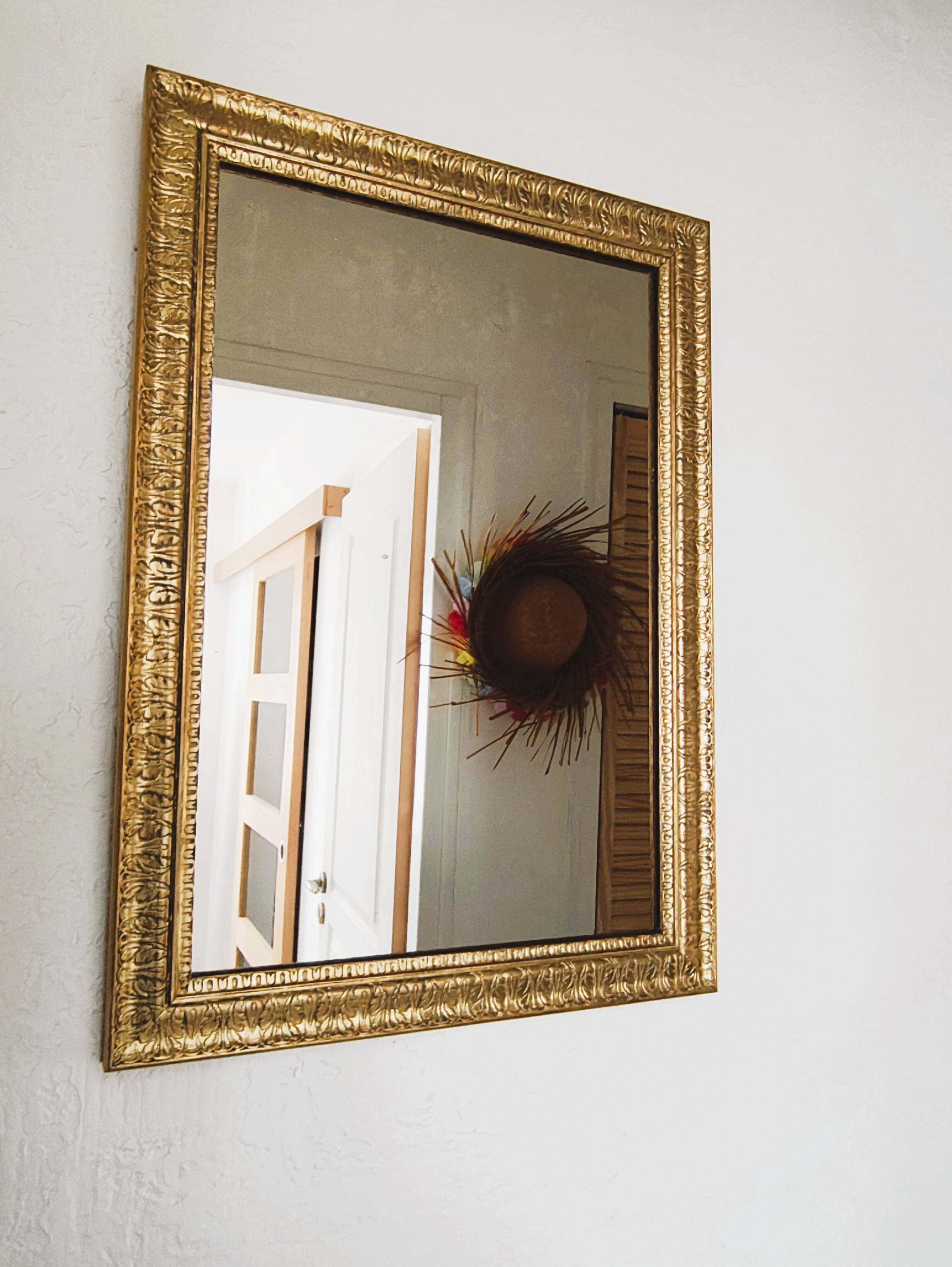 Antique gilded wooden rectangular mirror