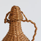 Bottle dressed in wicker