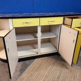 Vintage yellow sideboard, and black marble top.