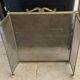 Vintage English fire screen in brass and gilded metal.