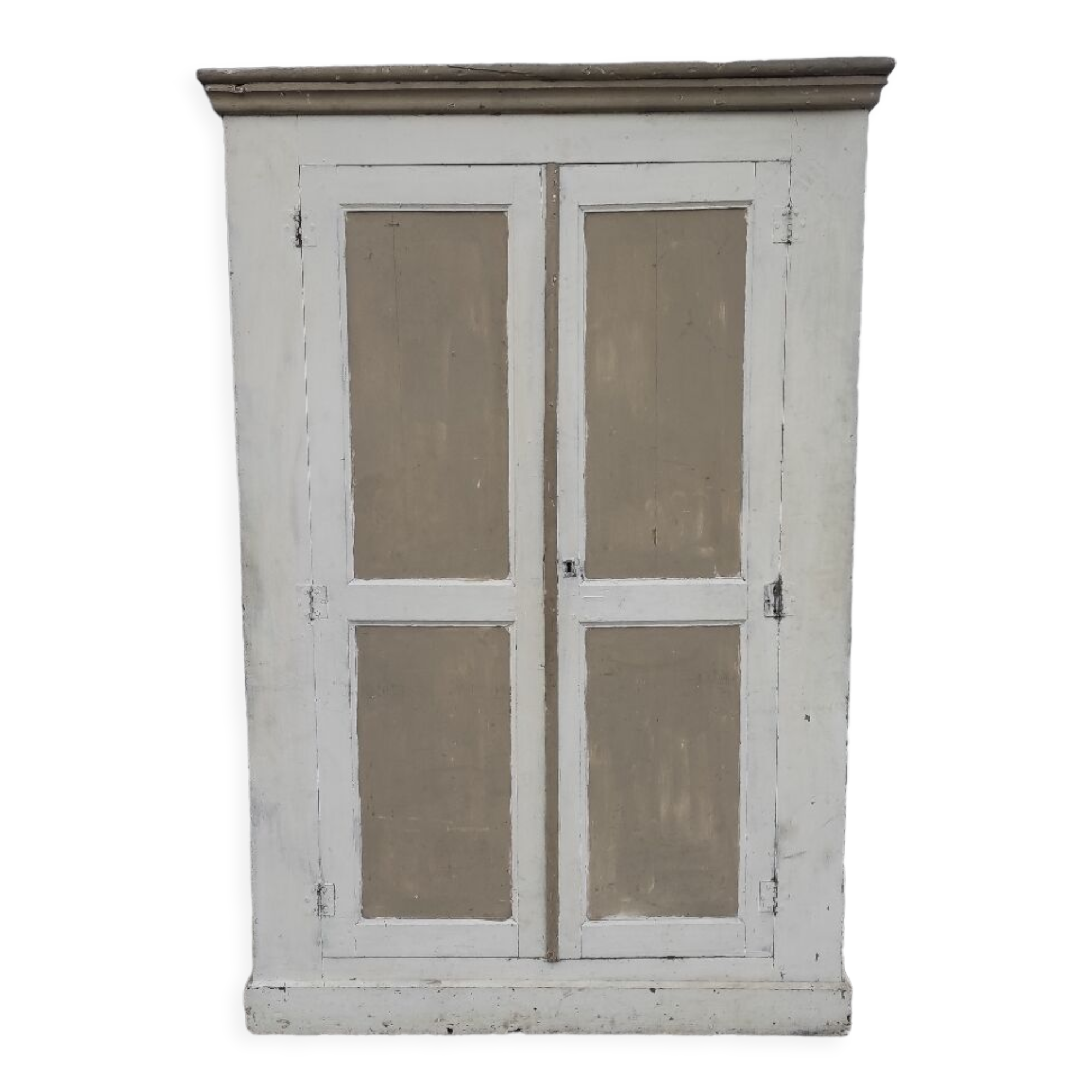 Old rustic Parisian wardrobe patinated in oak and fir