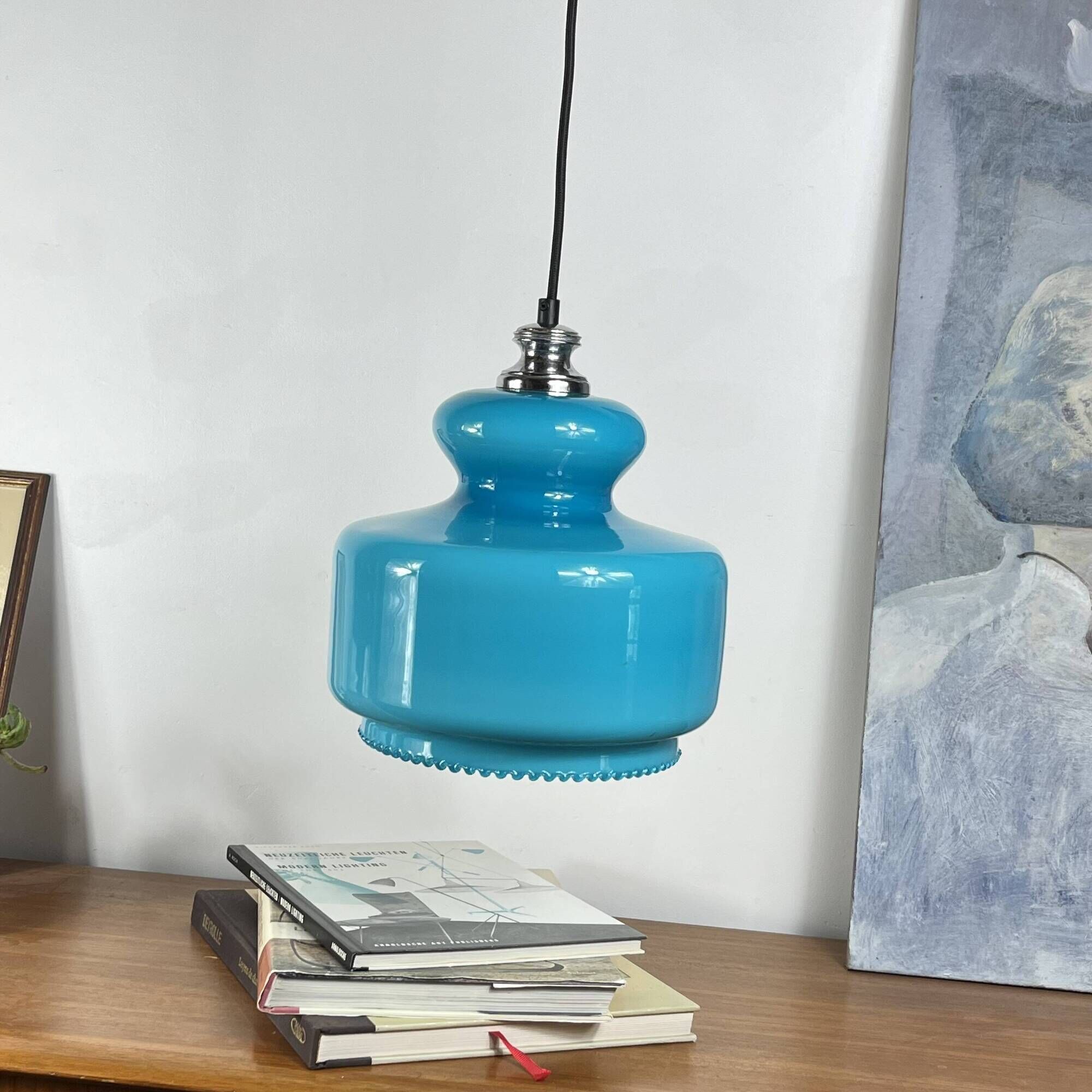 Suspension lustre globe in blue opaline glass from the 1970s.