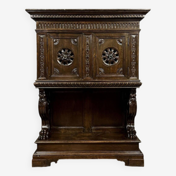 Renaissance style dresser cabinet in oak circa 1850 opening with 2 openwork and carved leaves