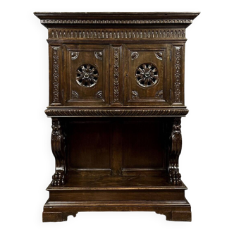 Renaissance style dresser cabinet in oak circa 1850 opening with 2 openwork and carved leaves