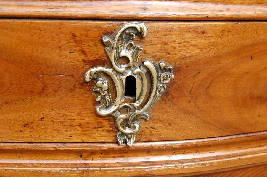 18th-century Louis XV walnut commode.