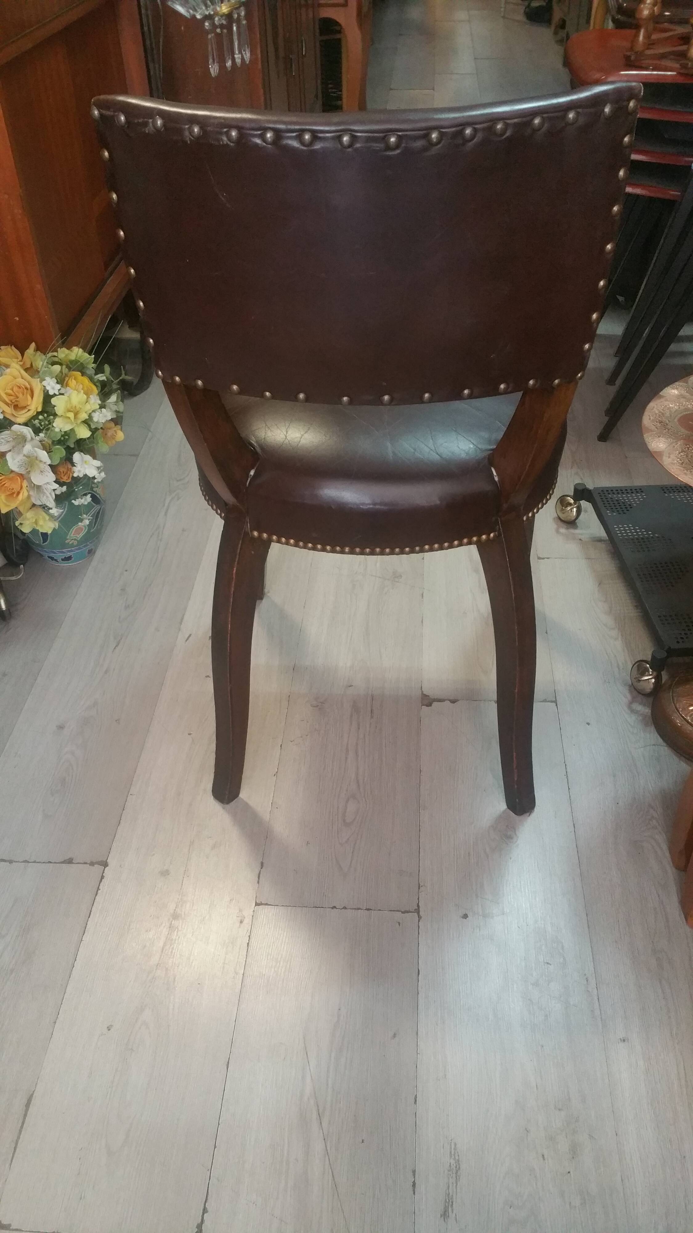 Lot of leather and vintage wood chairs