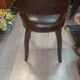 Lot of leather and vintage wood chairs