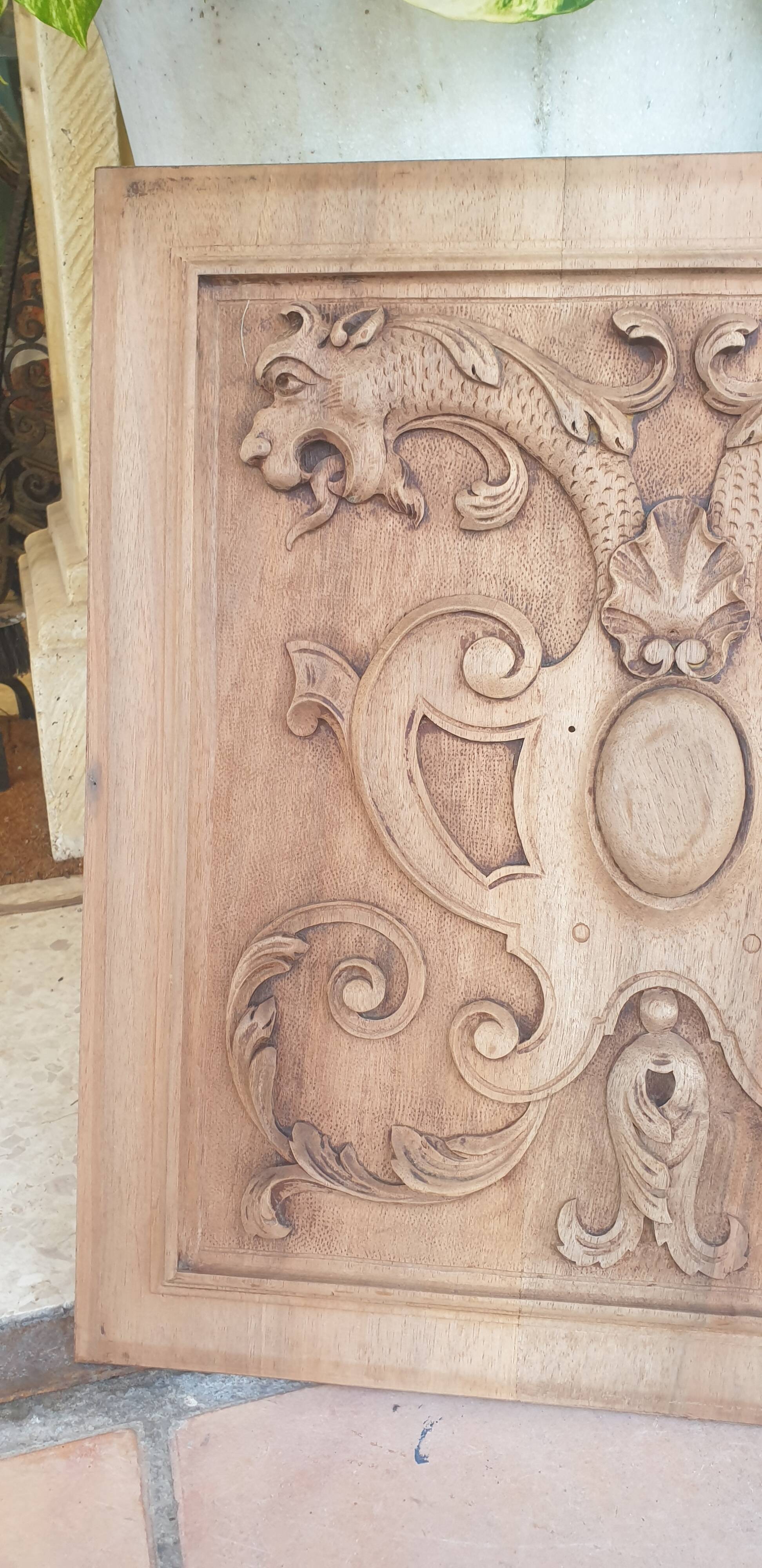 Pair of antique carved walnut panels