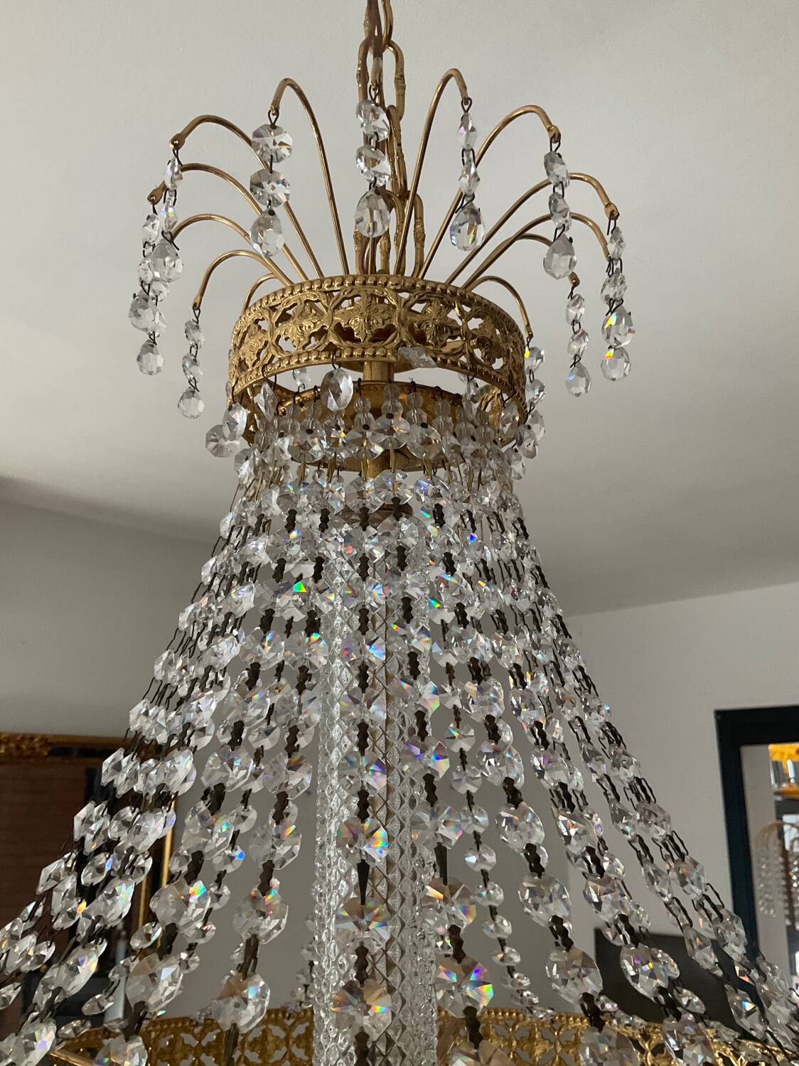 Brass hot air balloon chandelier with cascade of tassels