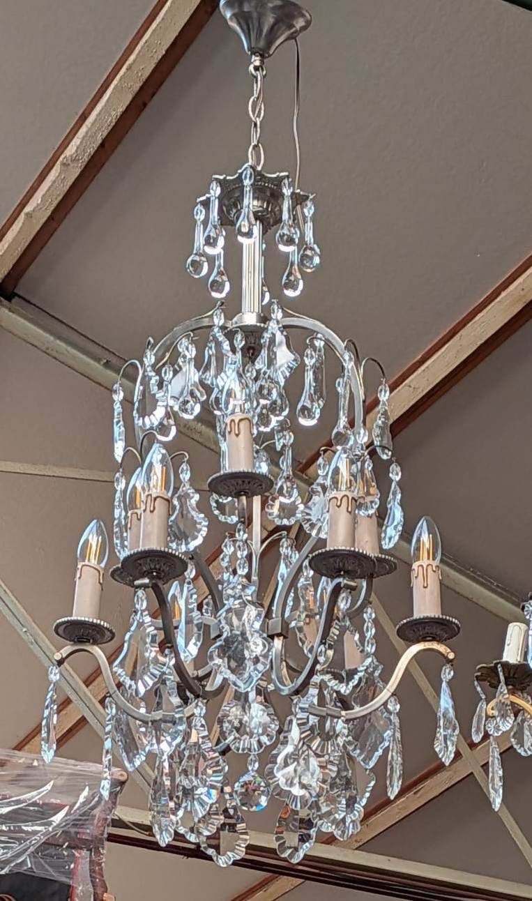 Rococo-style chandelier with 9 light arms.