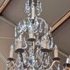 Rococo-style chandelier with 9 light arms.