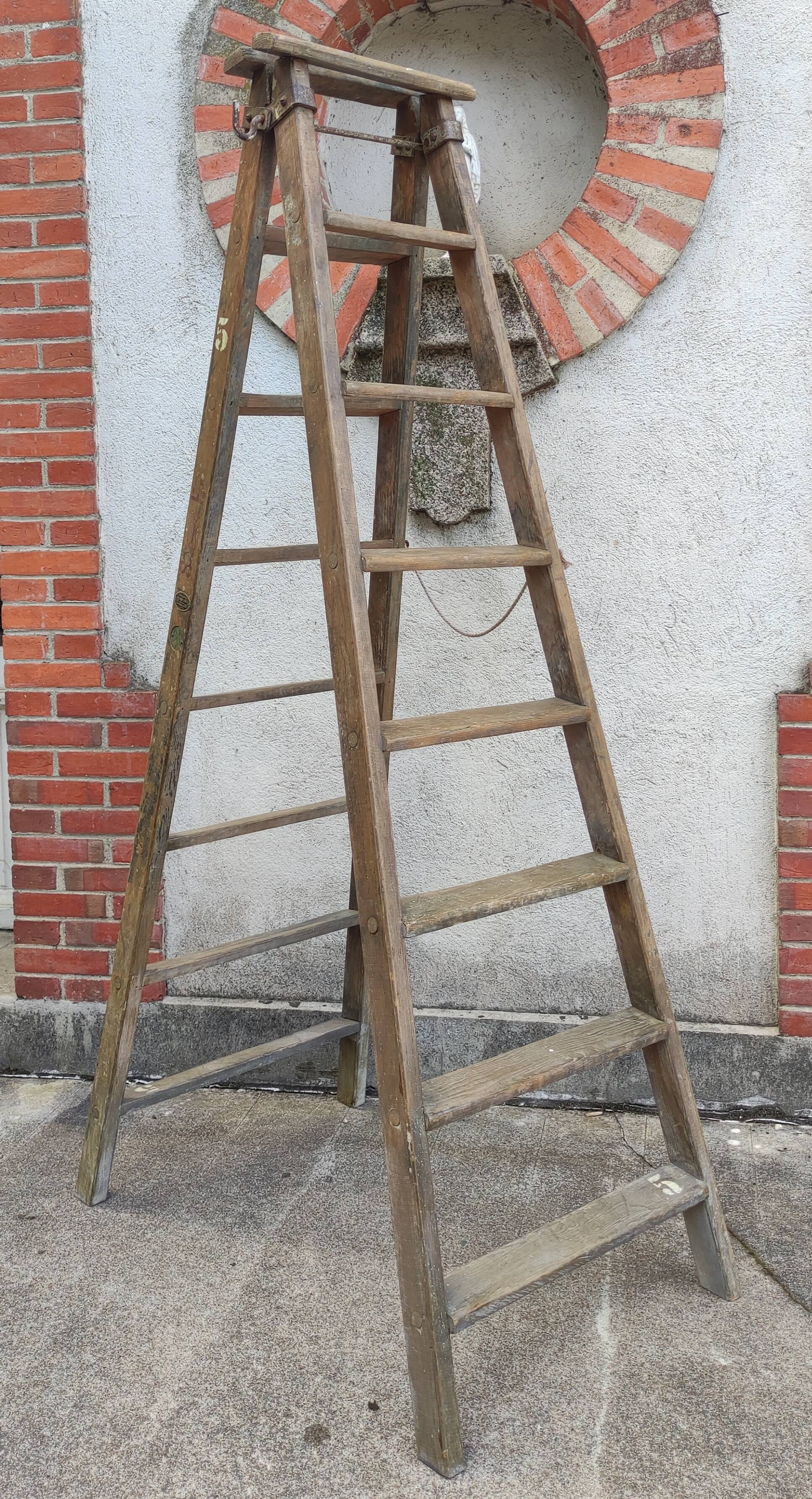 Old wooden stepladder stamped