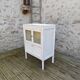 Patinated glass sideboard