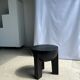 Black mango wood tripod side table with a semi-spherical top, height: 45 cm, diameter: 44 cm.