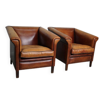 2 fauteuils club néerlandais vintage en cuir cognac