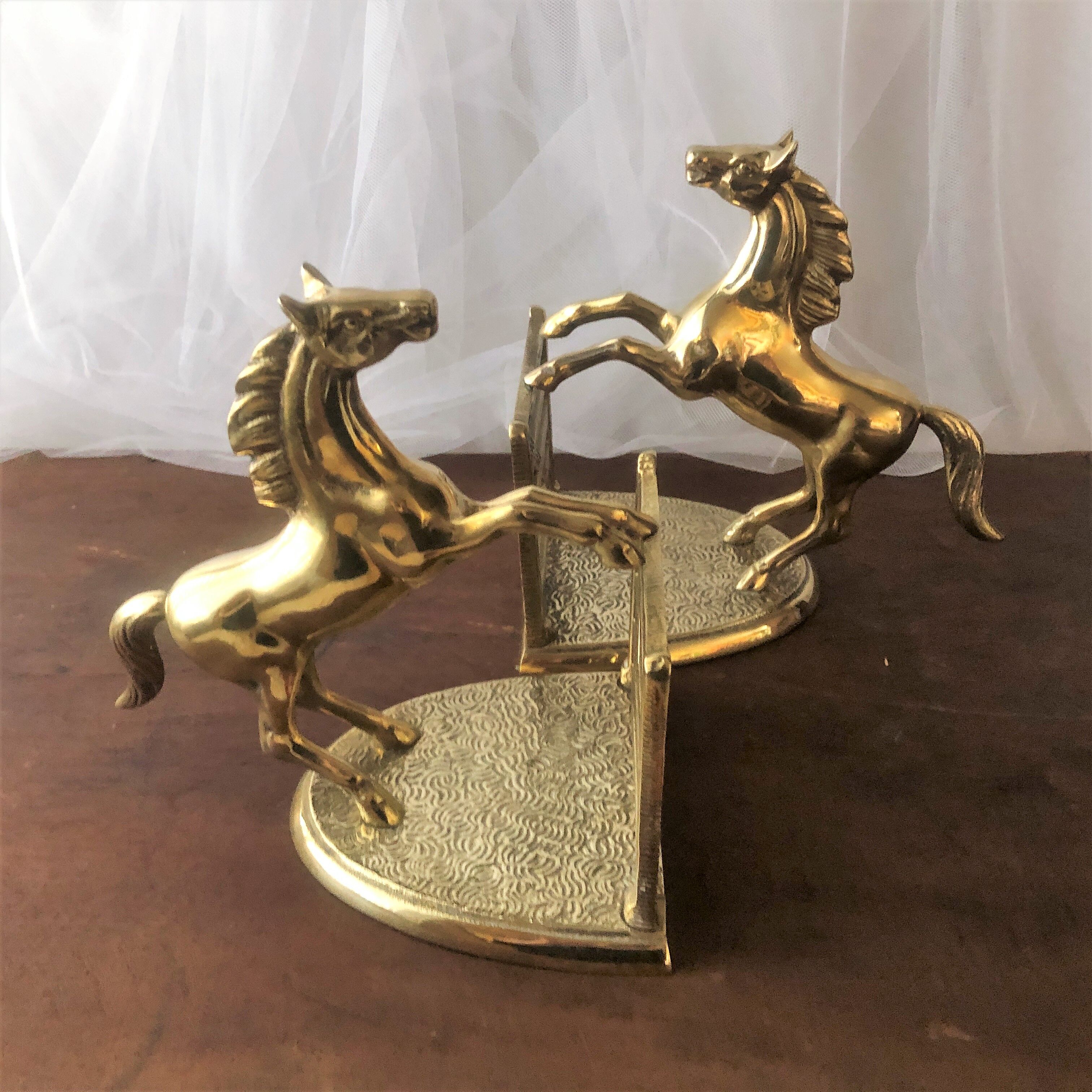 Goldeneye brass décor horses