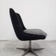 Mid-century redesigned swivel chair in velvet and faux fur.