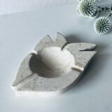 Travertine fish pocket emptier