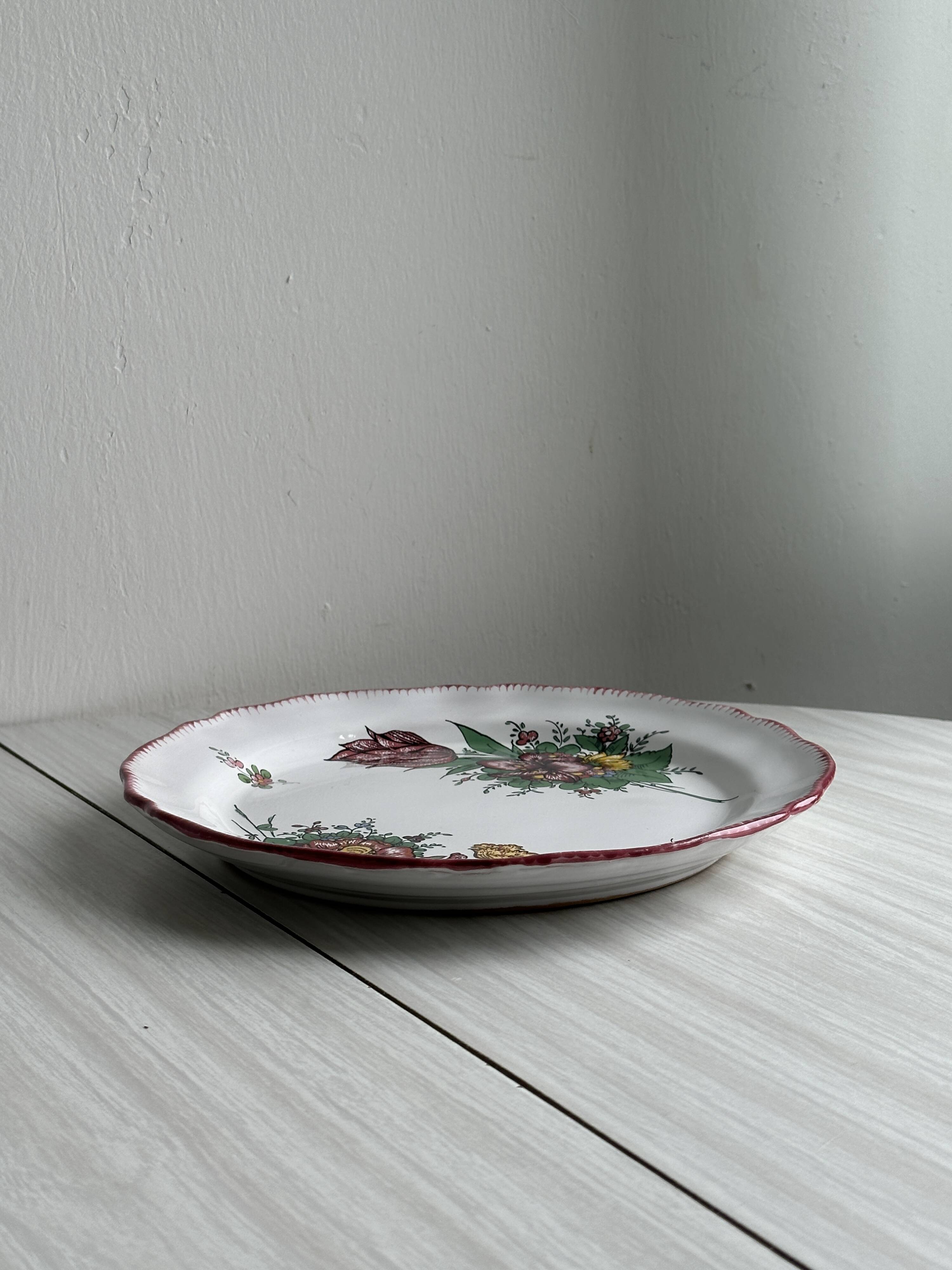 Decorative plate in Angoulême earthenware.