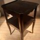 Black bedside table with two shelves, Louis XV style