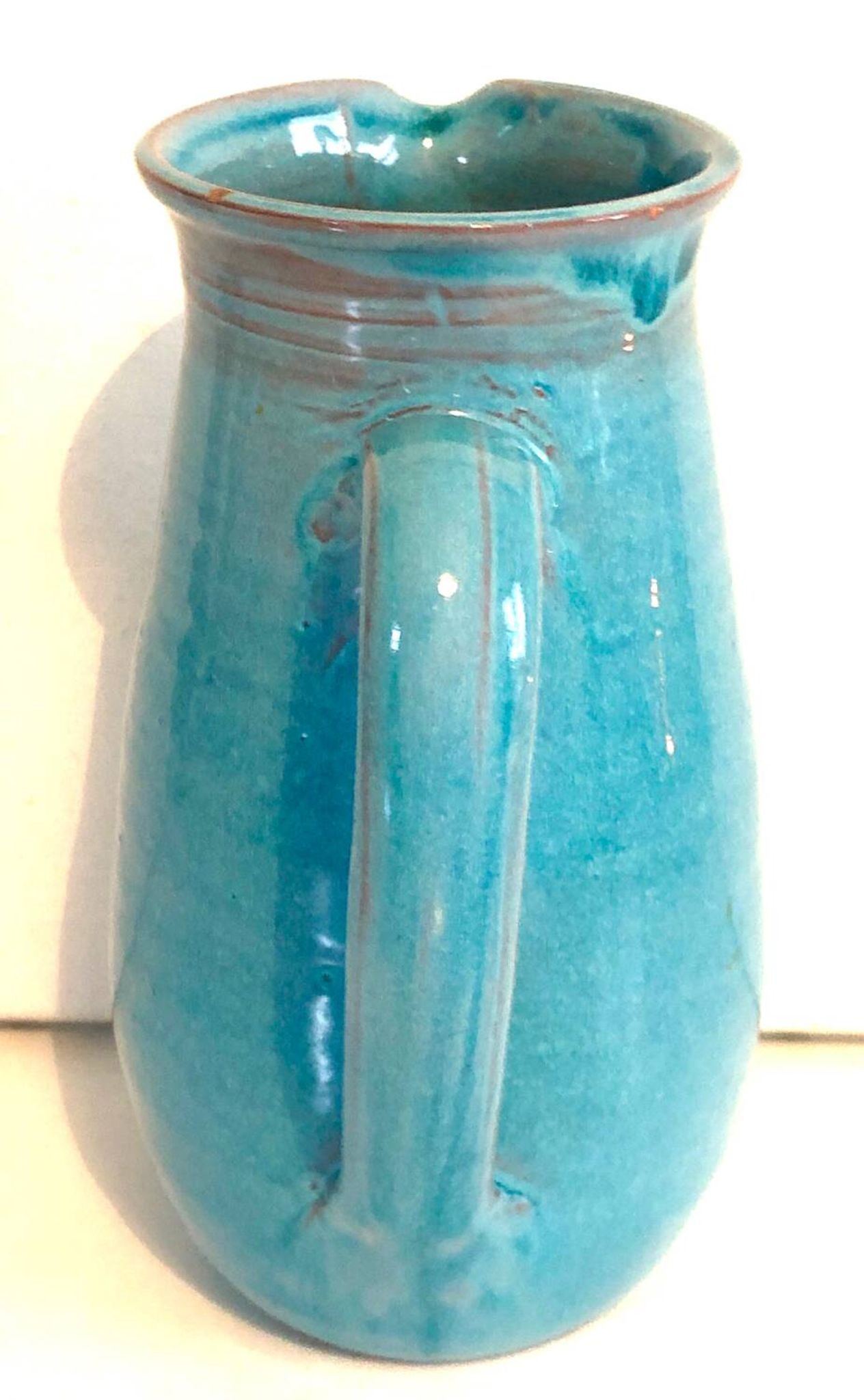 Blue ceramic pitcher