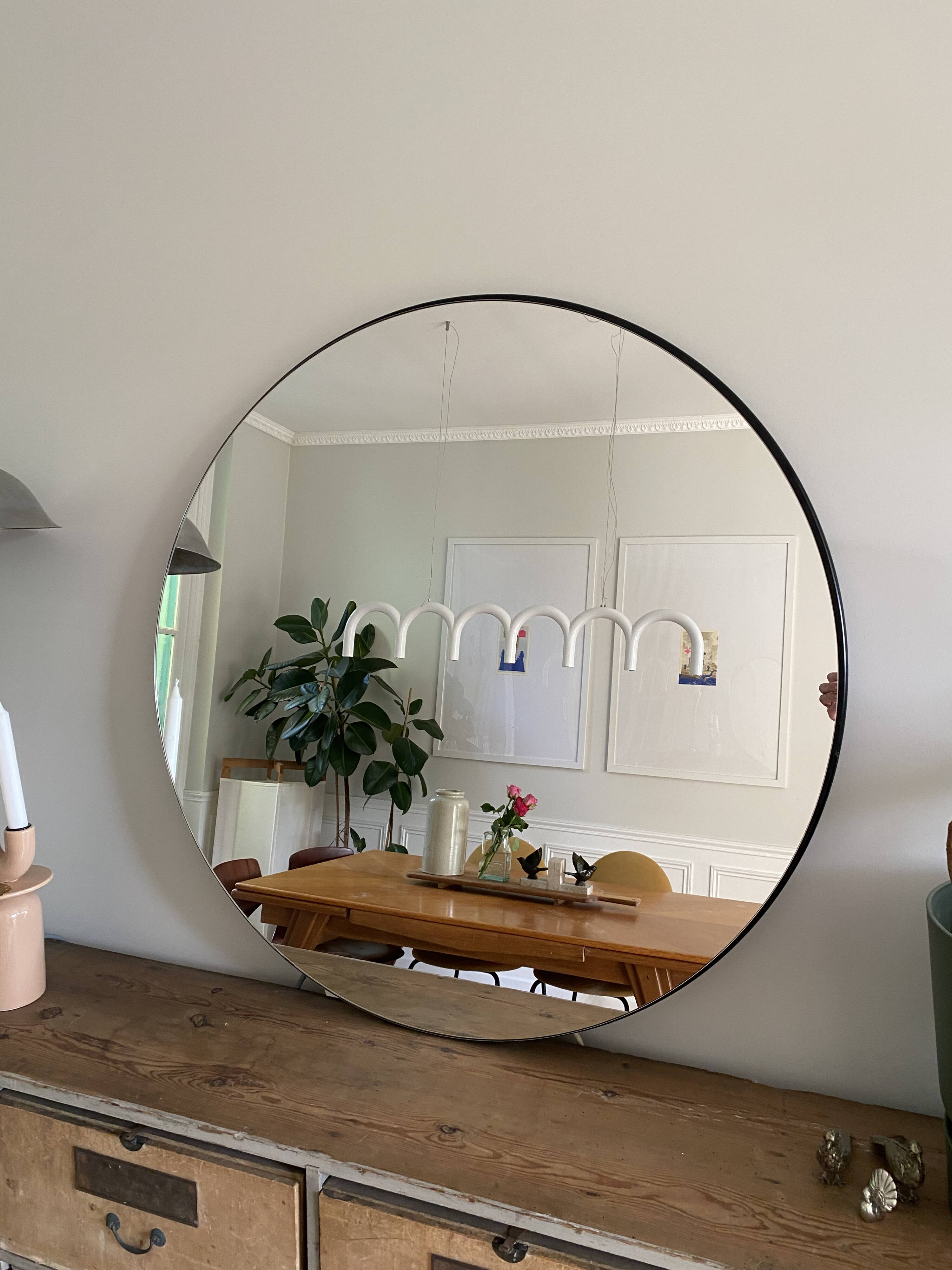 Round mirror, diameter 90 cm, mounted on MDF panel, black tinted frame