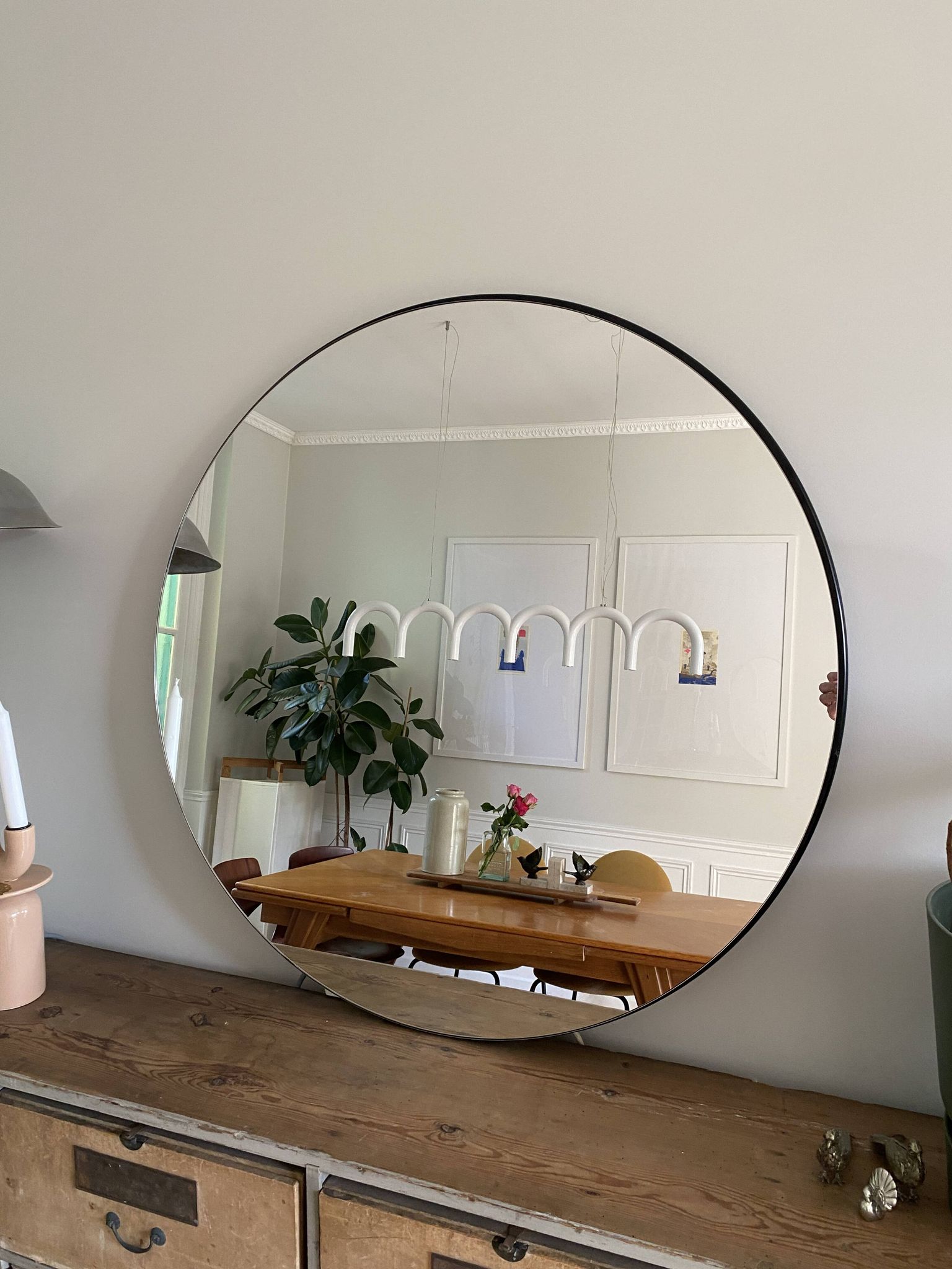 Round mirror, diameter 90 cm, mounted on MDF panel, black tinted frame