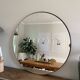 Round mirror, diameter 90 cm, mounted on MDF panel, black tinted frame
