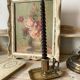 Antique brass thumb candle holder