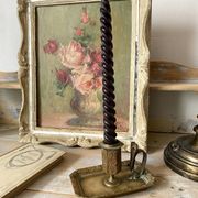 Antique brass thumb candle holder