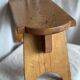 Rustic stool with compass legs, mountain furniture