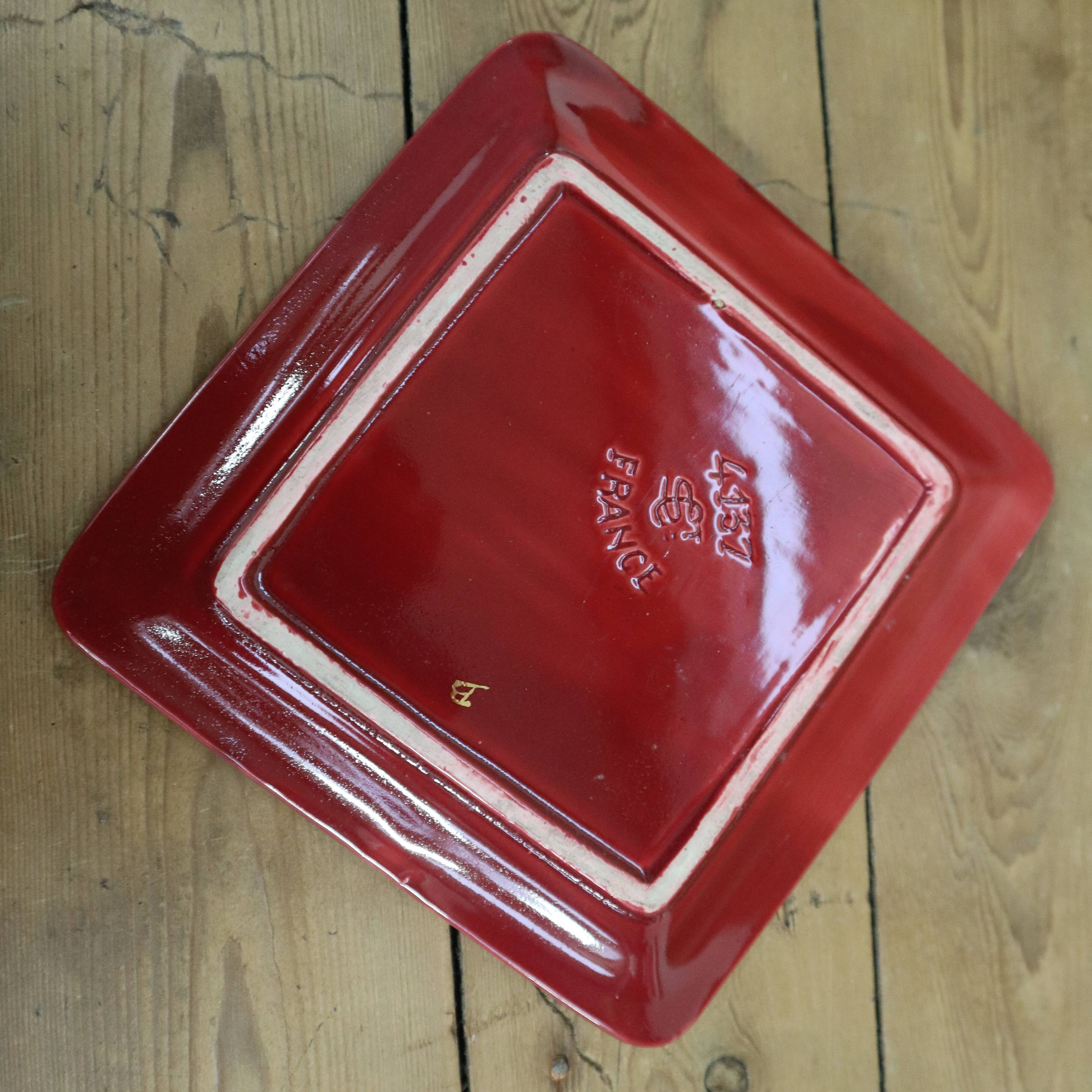 Saint Clément burgundy pocket emptier with gold trim