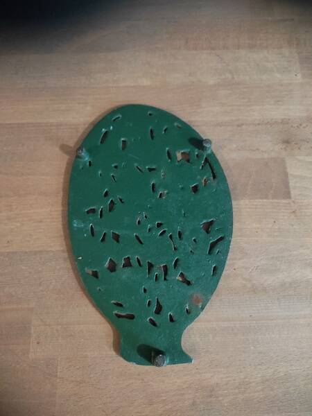 Cast iron patinated metal trivet Apple tree