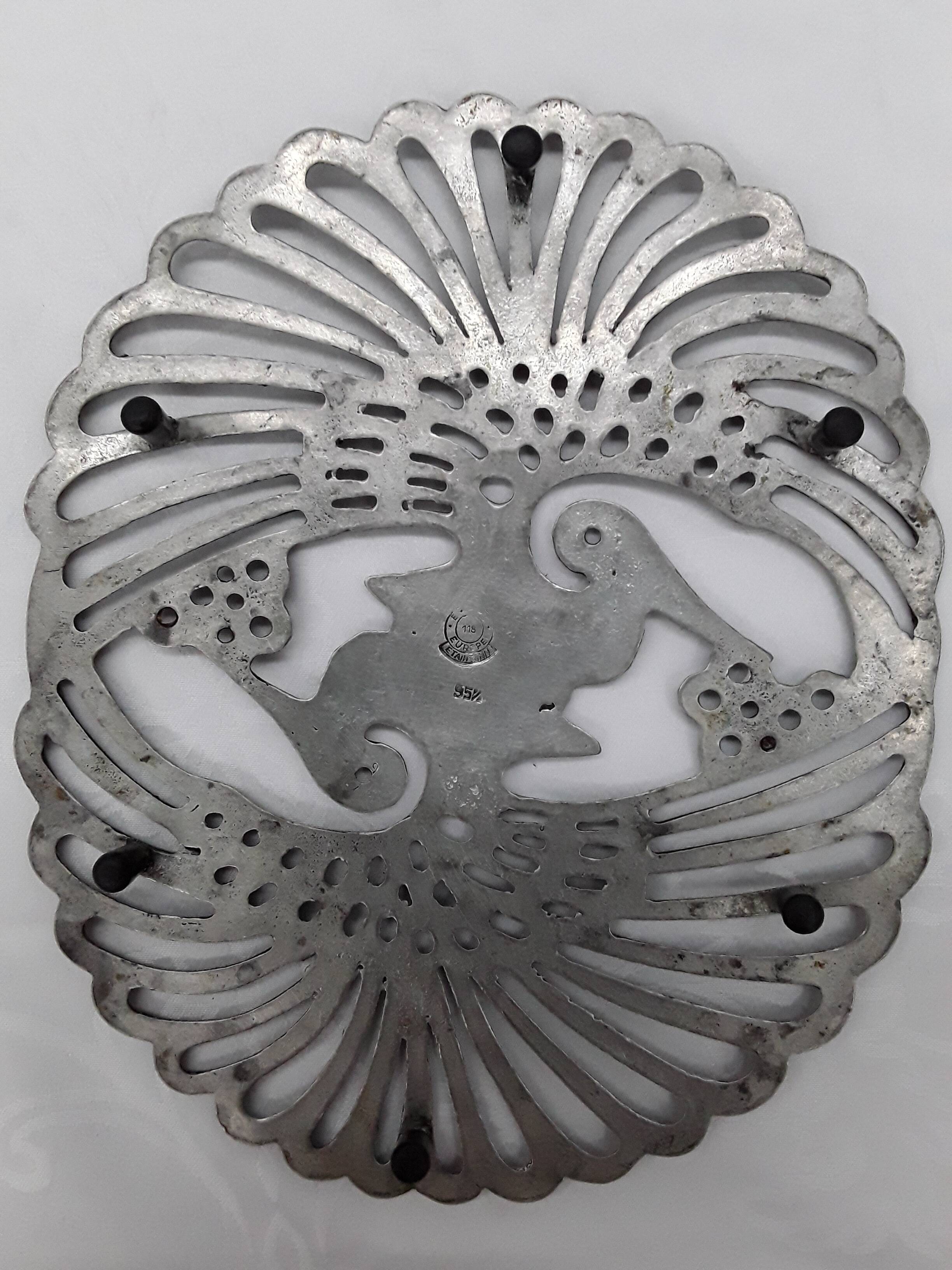 pewter trivet