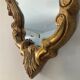 Old italian mirror in gilded plaster with leaf