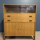 Storage furniture, vintage high sideboard in oak veneer.