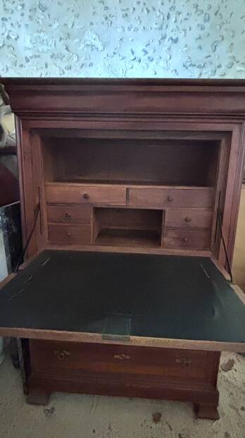 Secretary desk with mahogany and flame veneer.
