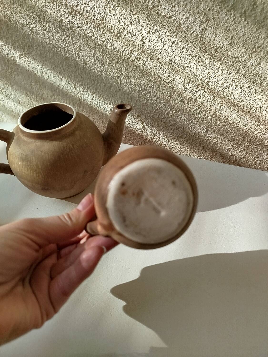 Teapot and small earthenware pot