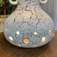 1970s lamp in white ceramic with its period shade.