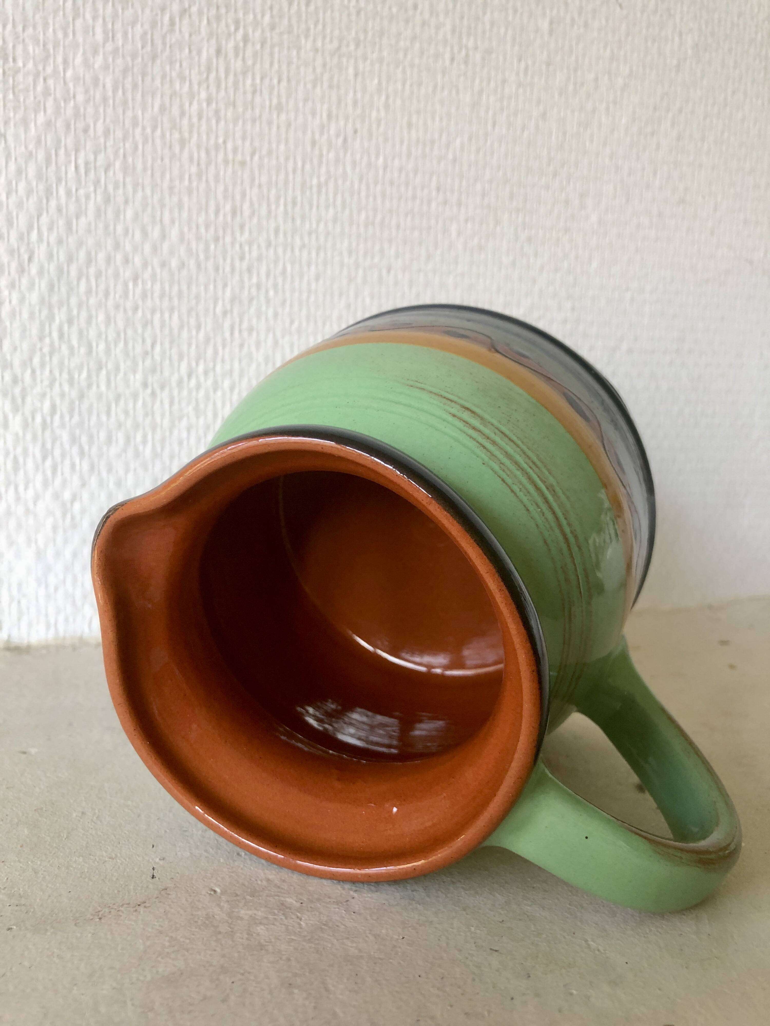 Artisanal terracotta pitcher/pottery