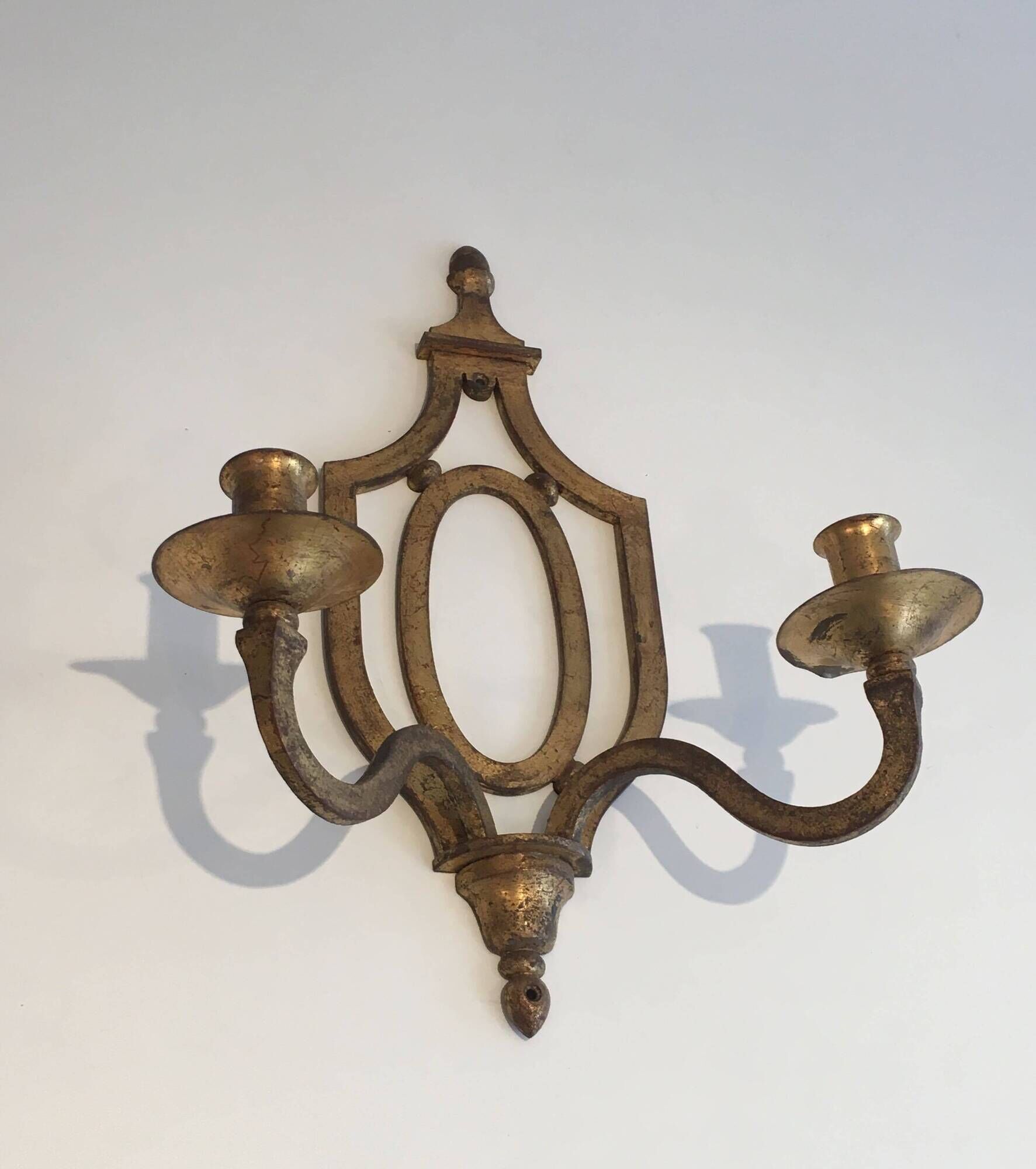 Golden Wrought Iron Wall Light with Oval Shield and Two Arms. French Work.