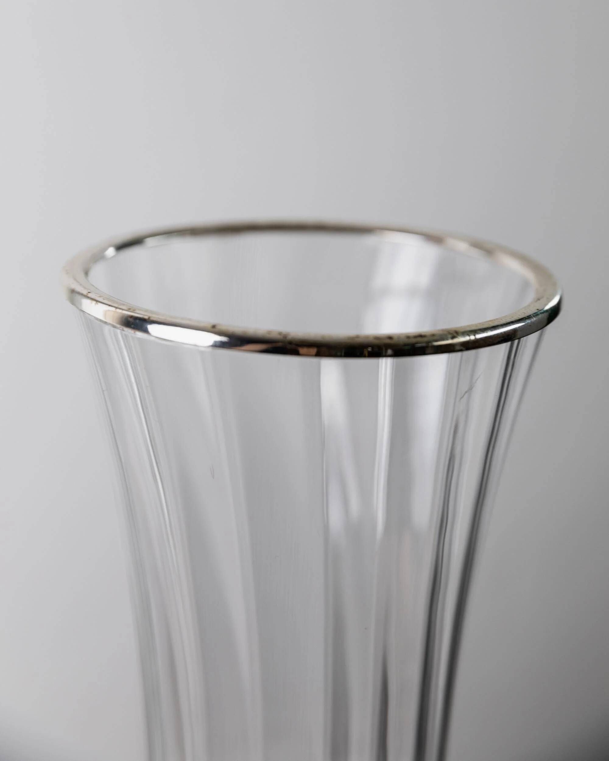 Vintage glass vase from the 1980s, transparent glass with fine linear pattern and silver metal details, elegant sculptural flower vase, gift idea.