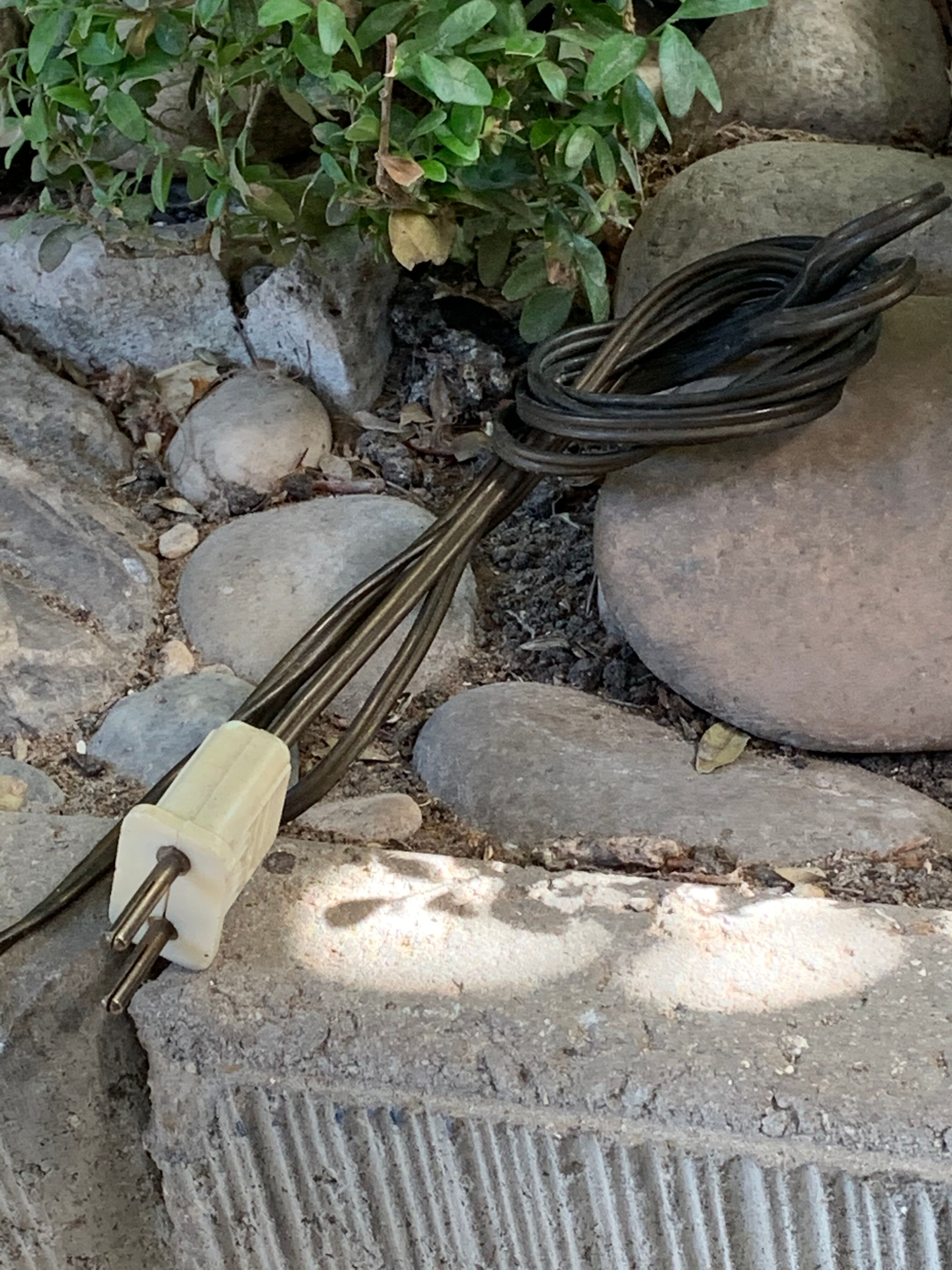 Pair of tripod lampposts 1960