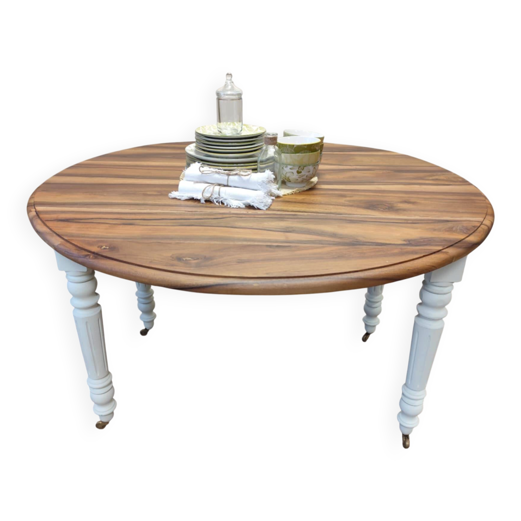 Round walnut table convertible into a console.