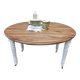 Round walnut table convertible into a console.