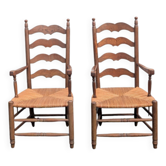 Paire de fauteuils paillés